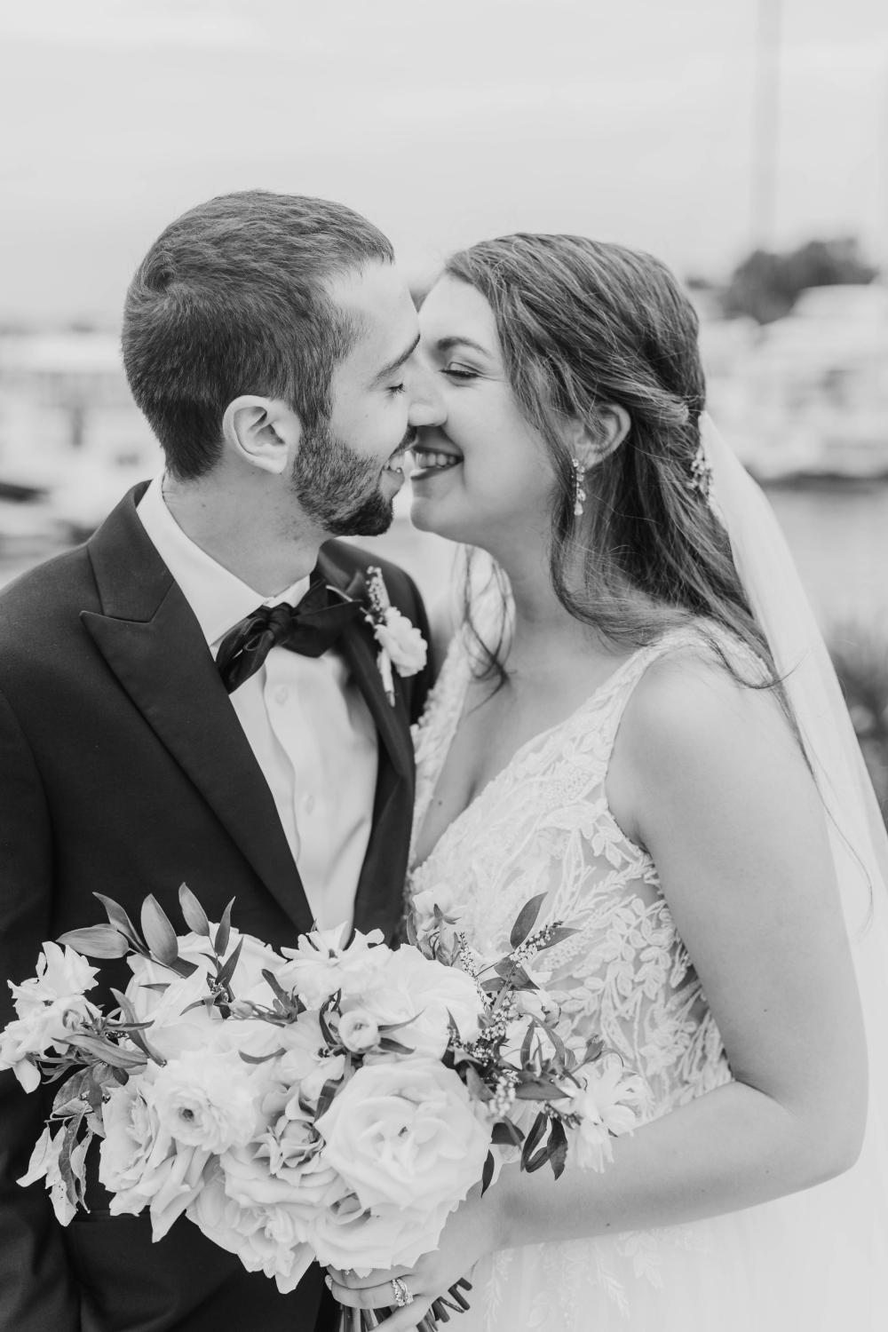 black and white wedding photo of bride and groom 