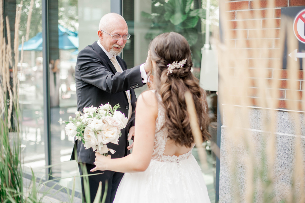 brides first look with father before micro wedding at La Vie