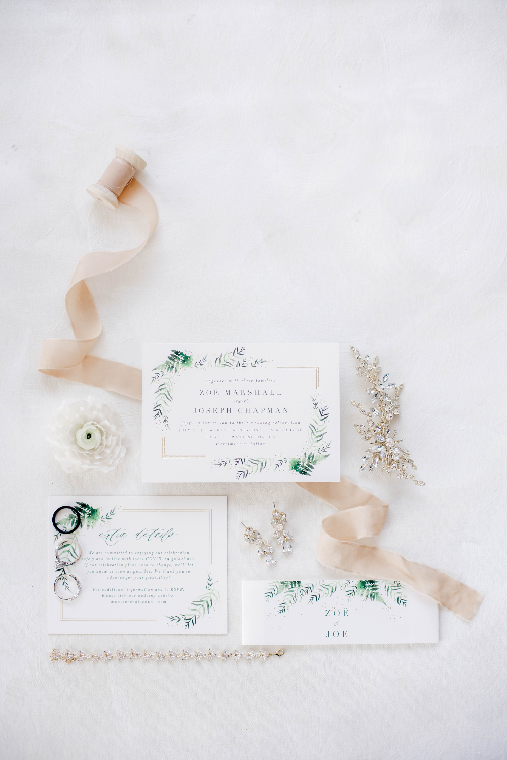 stunning white and greenery wedding invitations