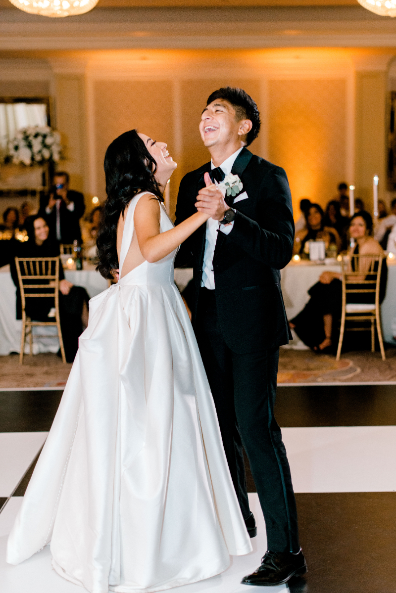 bride dances with brother at wedding