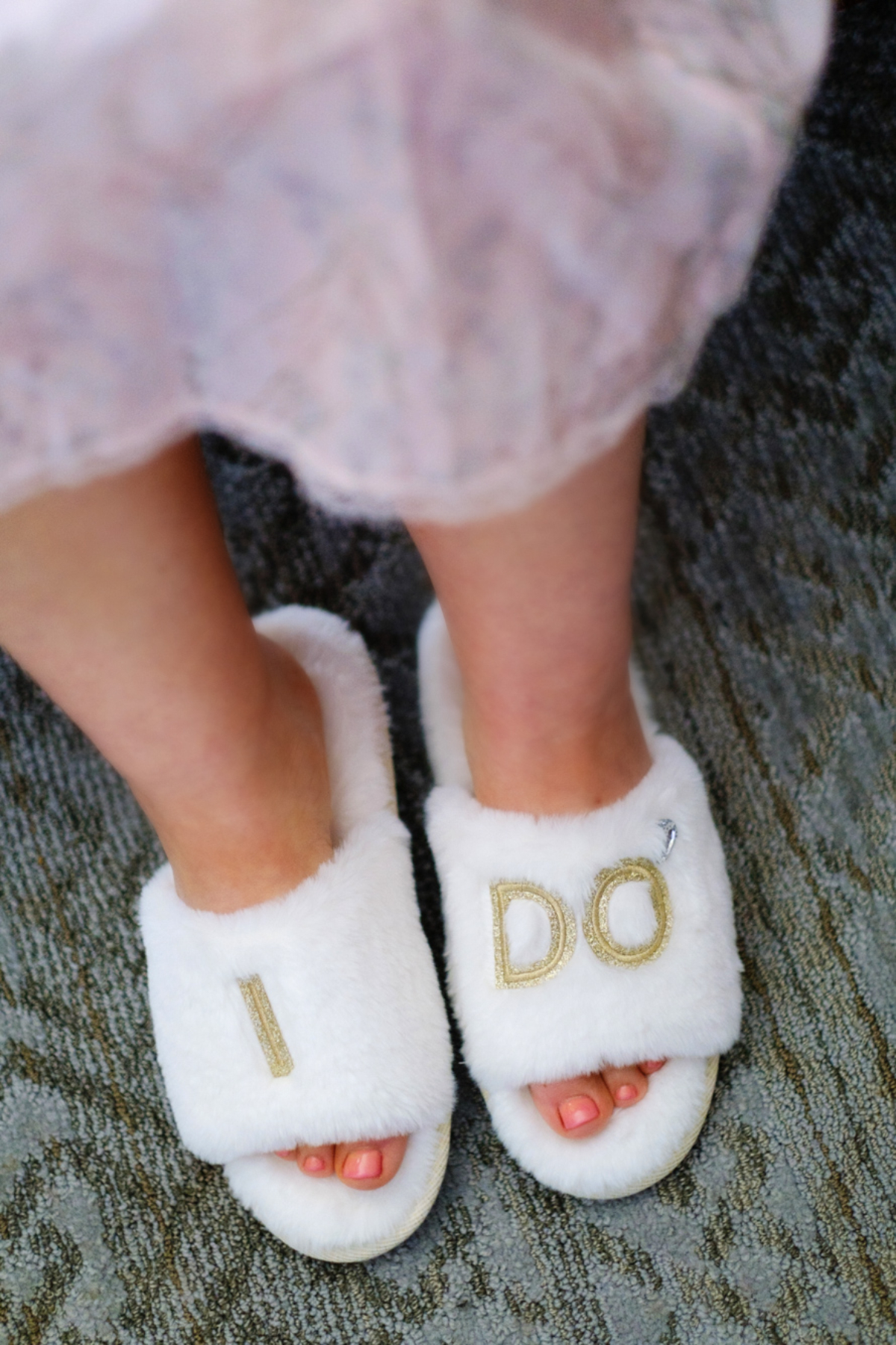 i do slippers for the bride during getting ready photos