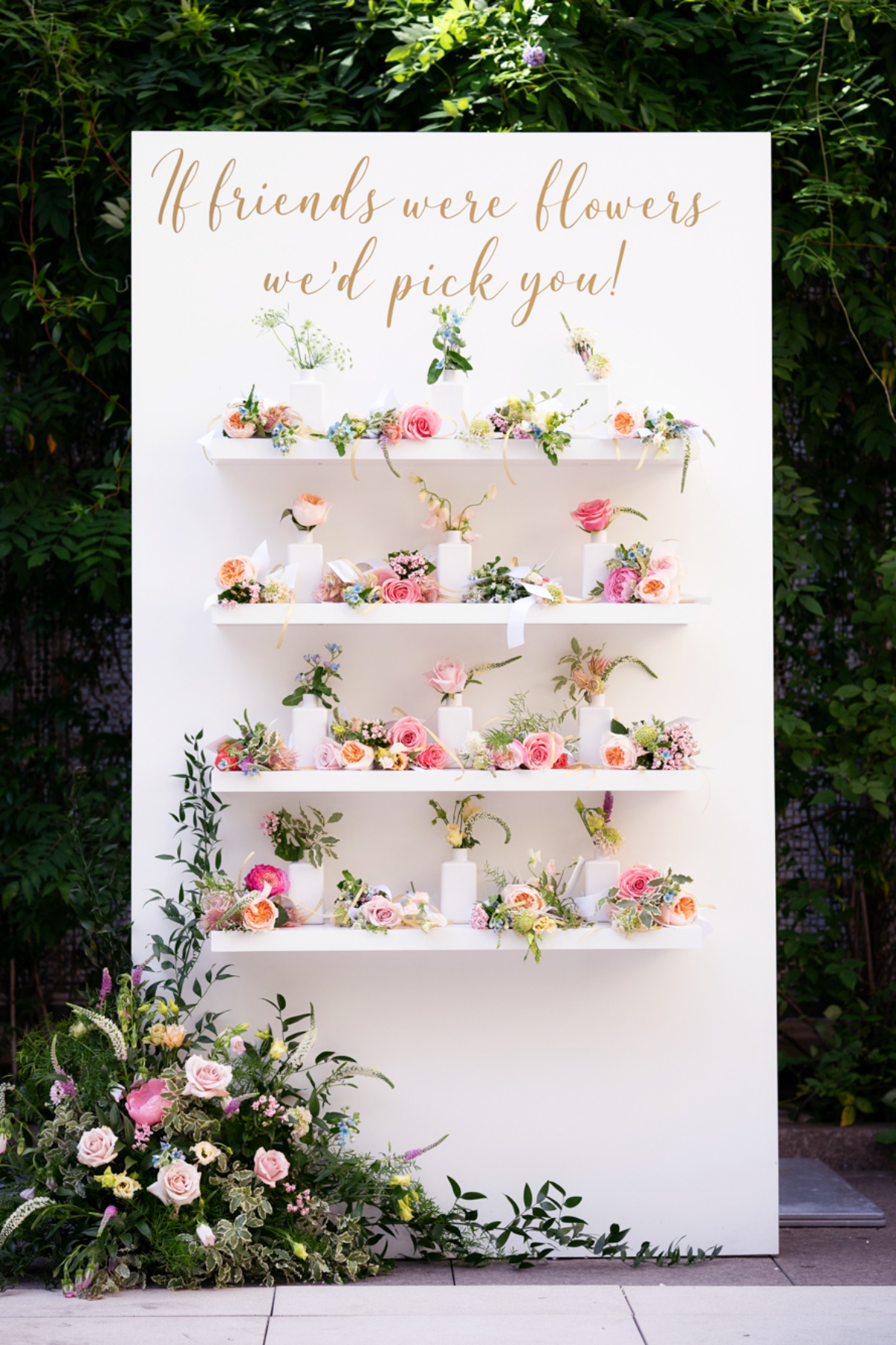 luxury escort display with shelves of flowers