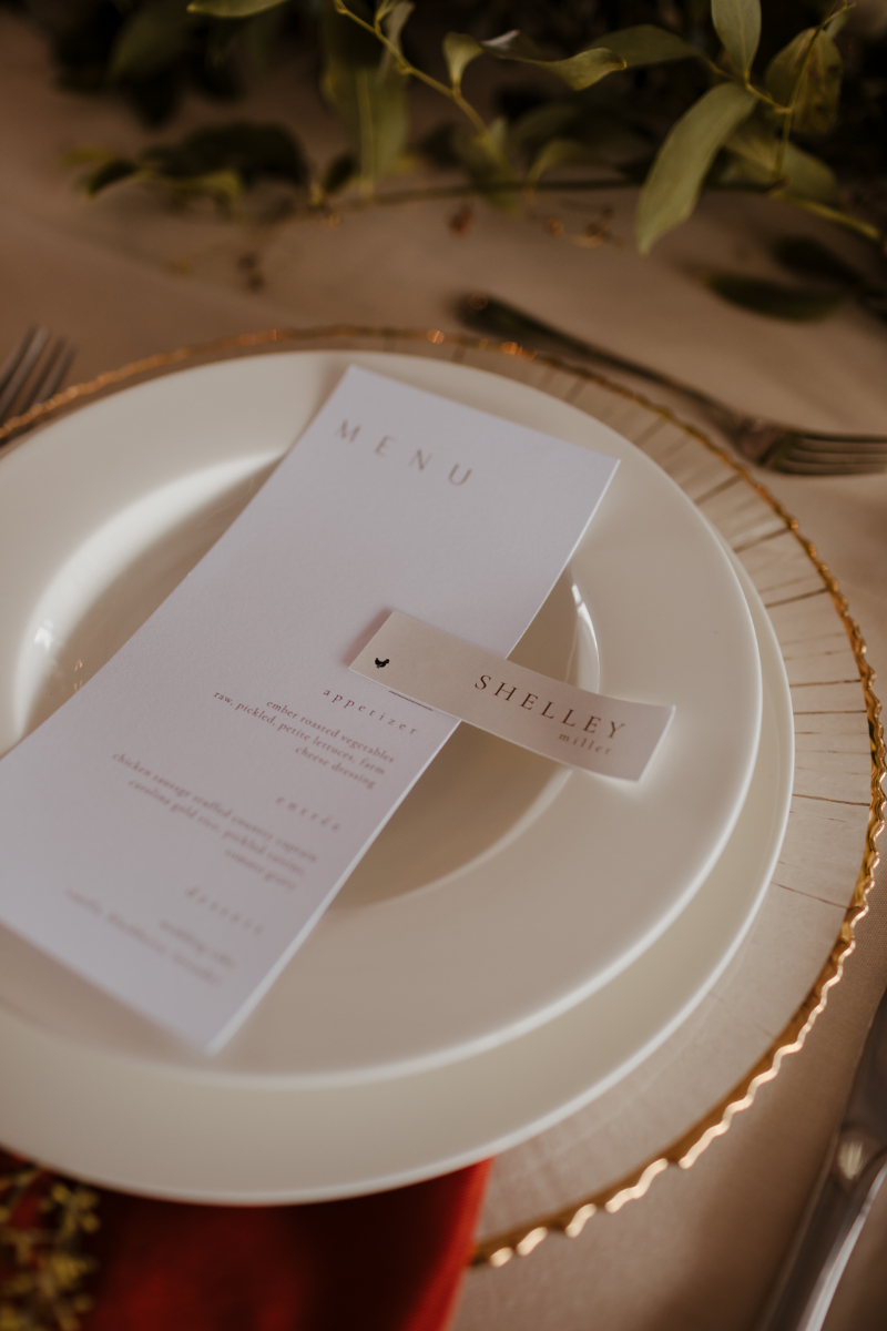 closeup of white menu cards and white place cards
