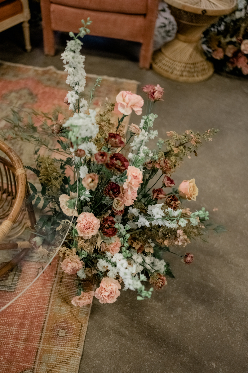 low and lush floral arrangement during Auto Shop DC wedding reception