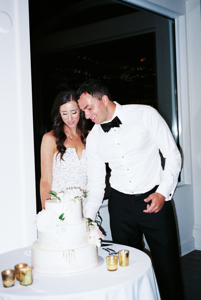 CAKE CUTTING AT BELLE MER WEDDING RECEPTION
